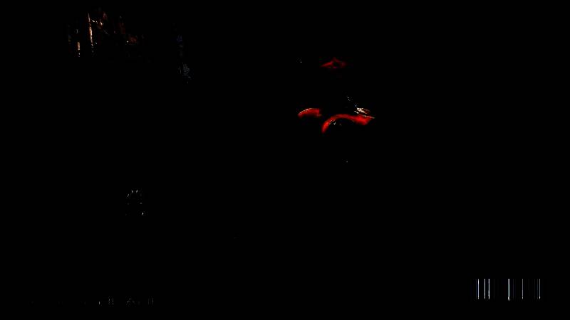 伊芙在废墟城市中腾空斩击，身后是爆炸与火焰交织的战斗场景