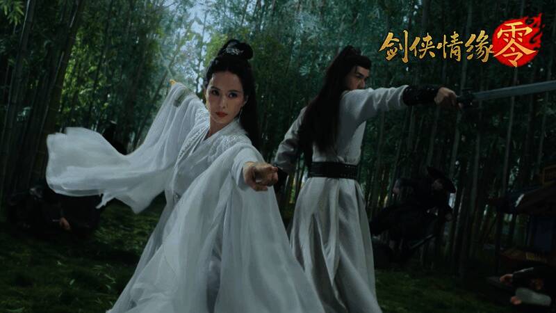 游戏宣传海报，李若彤与主角并肩而立，画面充满武侠气息