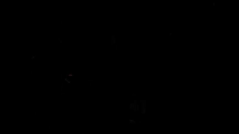 Remedy开发团队工作场景，成员正专注调试《FBC: Firebreak》的游戏界面