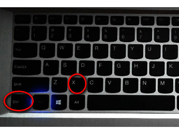 键盘上Ctrl与X键被高亮标注，提示用户快捷键位置