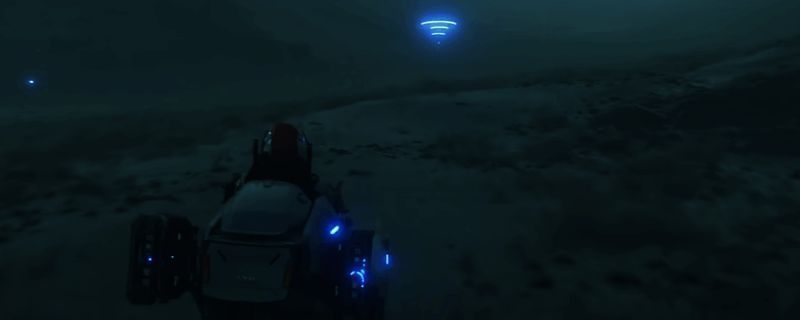 死亡搁浅2中玩家与机械大章鱼BOSS对战画面，机械章鱼发出耀眼黄光，主角使用喷子瞄准攻击