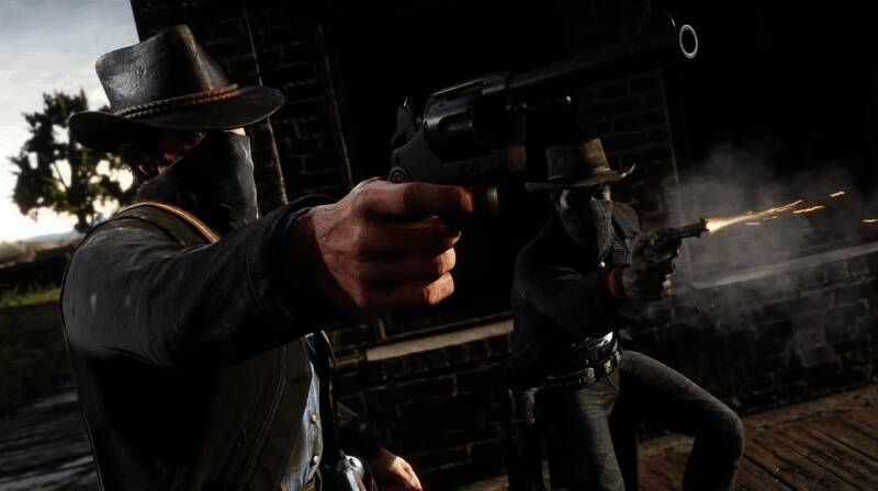 R星办公室内部图，开发者们围绕一台电脑进行调试，气氛紧张