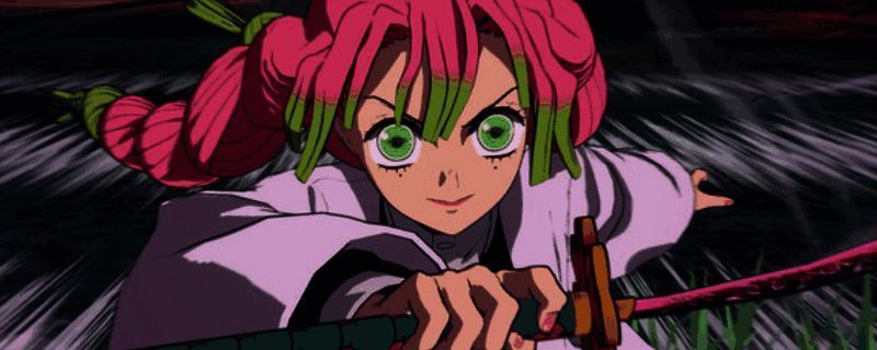 鬼灭之刃火之神血风谭2游戏封面展示，主角手持日轮刀站立于火焰背景中