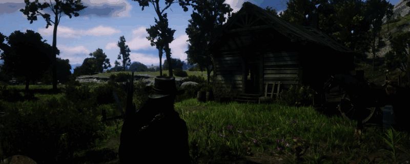 《荒野大镖客2》中翡翠牧场上方诡异房屋内部场景，骷髅坐在桌旁桌上放着一封信