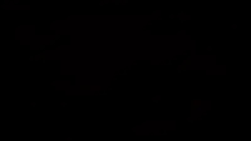 主角跪在地上掩埋同伴尸体，神情悲伤，背后是一轮落日映照着沙丘