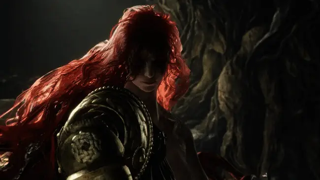 《艾尔登法环》中圣树之女玛莲妮亚战斗场景，华丽技能特效与紧张战斗氛围展现无遗