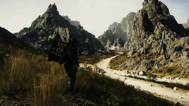 小岛秀夫手持《死亡搁浅》游戏模型，神情坚定