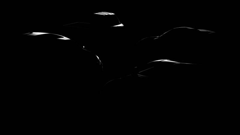 游戏界面截图显示四辆新车的预览图，包括法拉利和雪佛兰等品牌