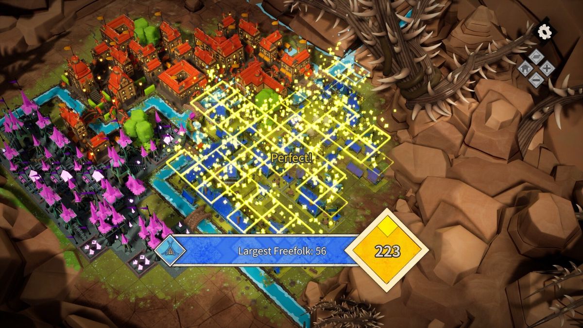 小镇建成后的俯视图，房屋排列整齐，绿植点缀其间，桥梁横跨河流，整体画面和谐美观