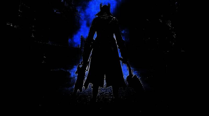 shadPS4模拟器运行《血源》的实机画面，展示昏暗哥特风格城市中的战斗场景，角色手持武器与巨型怪物激烈交战，画面充满暗黑恐怖氛围