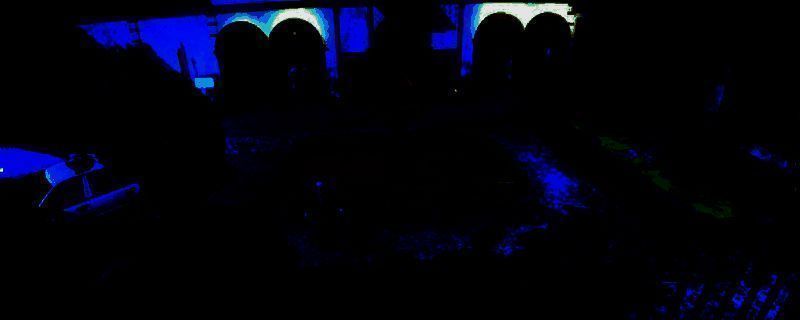 《Spectator 2》游戏主视觉图，昏暗场景中角色背对镜头，周围布满诡异符号与血迹，营造强烈恐怖氛围