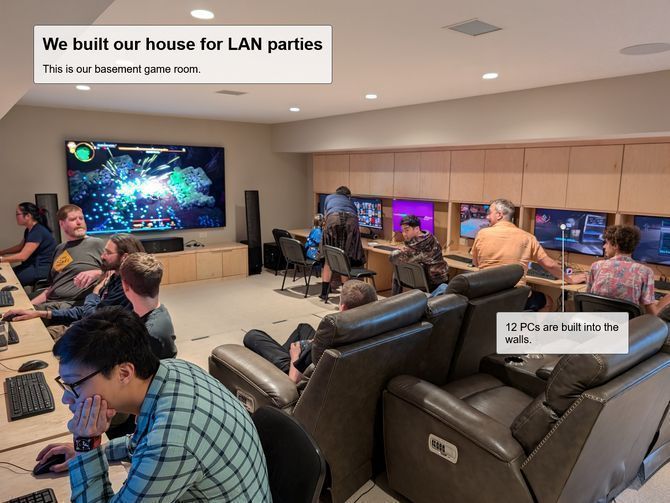 LAN游戏屋全景图，12个座位整齐排列，每台设备连接显示器，灯光氛围感十足