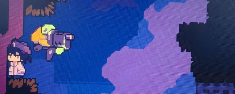 玩家角色站在多洛可小镇西侧峭壁左侧小树叶上，准备起跳，背景为悬崖与远处小镇风光