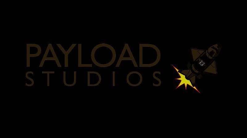 Russel Clarke 在游戏展会上演讲的画面，背景为《泰拉科技》游戏界面展示