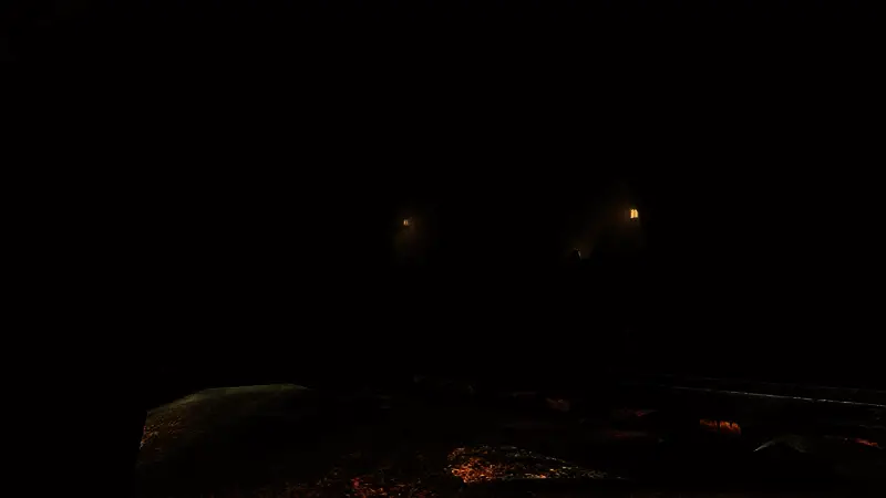 玛鲁加矿山内部场景，导力灯照亮狭窄矿道，矿车轨道延伸至幽深洞穴