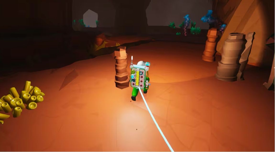 玩家驾驶越野车驶入一个宽阔的洞穴入口，洞口呈弧形，内部光线昏暗但通道清晰