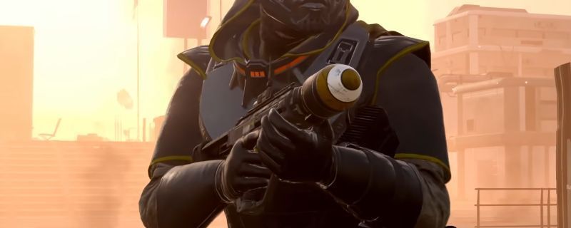 《绝地潜兵2》中玩家手持GP-31最后通牒核弹发射器准备发射，屏幕中央瞄准光标锁定远处目标，背景为外星战场硝烟弥漫