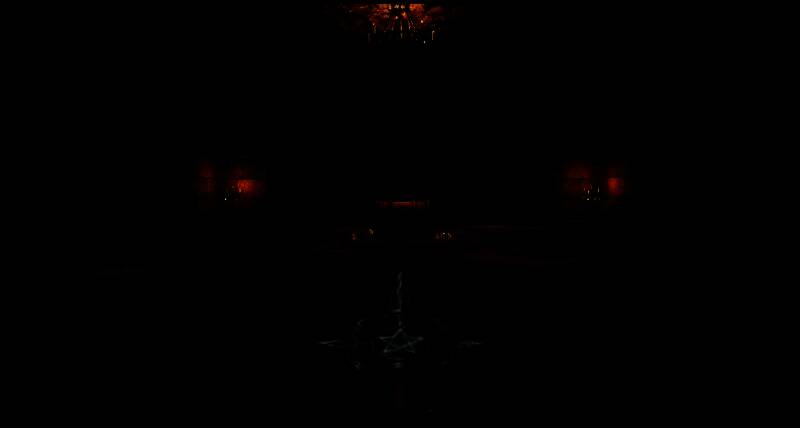 游戏场景截图：昏暗的石砌走廊布满血迹与符文，远处有红色雾气翻涌