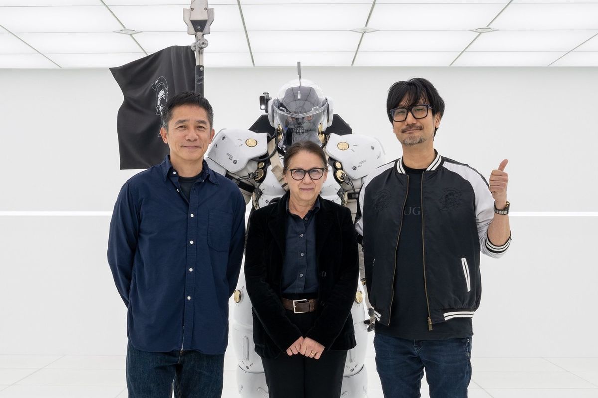 签名板特写，清晰可见梁朝伟用中文签下的名字