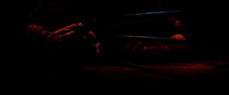 《漫威金刚狼》概念艺术图，主角身穿标志性黄色战衣，背景为昏暗城市街道