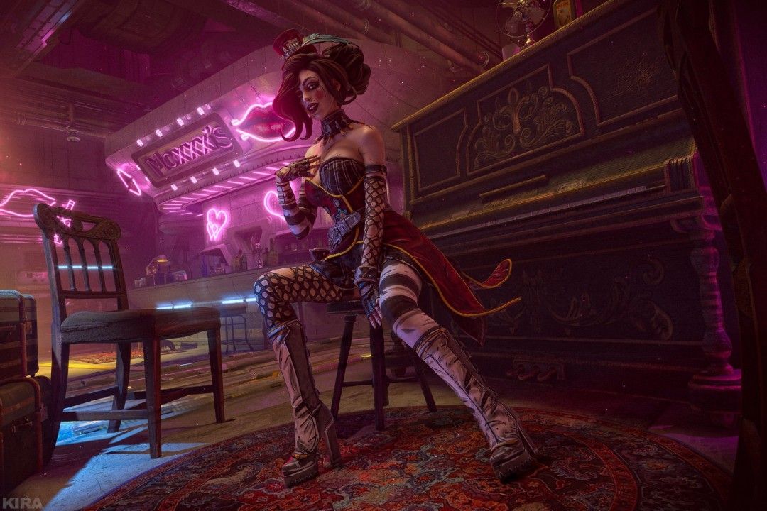 Randy Pitchford过往采访画面，背景为《无主之地》系列游戏画面