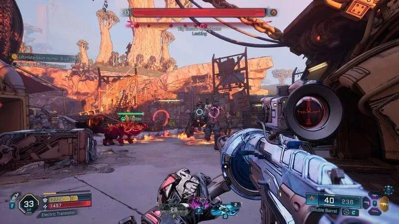 《无主之地4》主视觉图，角色手持夸张武器站在荒原上，背景是色彩斑斓的外星地貌