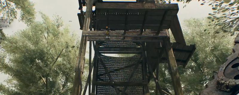 渔夫塔安全塔所在小岛的俯视图，显示塔楼位于河道中央，周围水域环绕，岸边可见可攀爬的岩石凸起