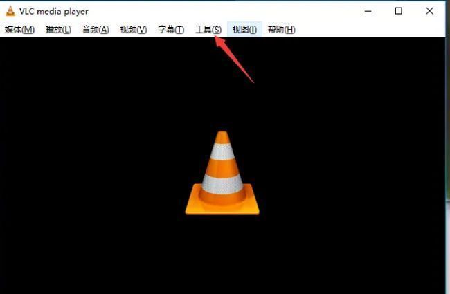 VLC media player主界面，顶部菜单栏中的'工具'选项被鼠标指向，准备点击进入