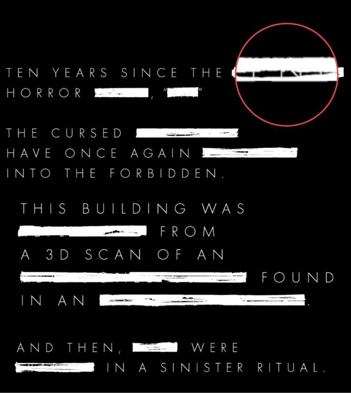 预告片中被遮挡文字的特写画面，部分英文字母隐约可见