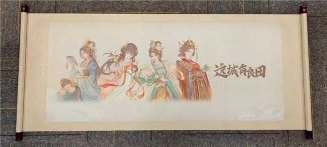 何丹凤与何奕含母子在展览现场共同展示大型剪纸作品，背景为‘广州之夜’活动标识