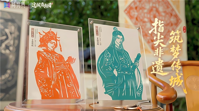 剪纸作品特写，凤凰展翅于祥云之间，细节处可见精细的手工刀工